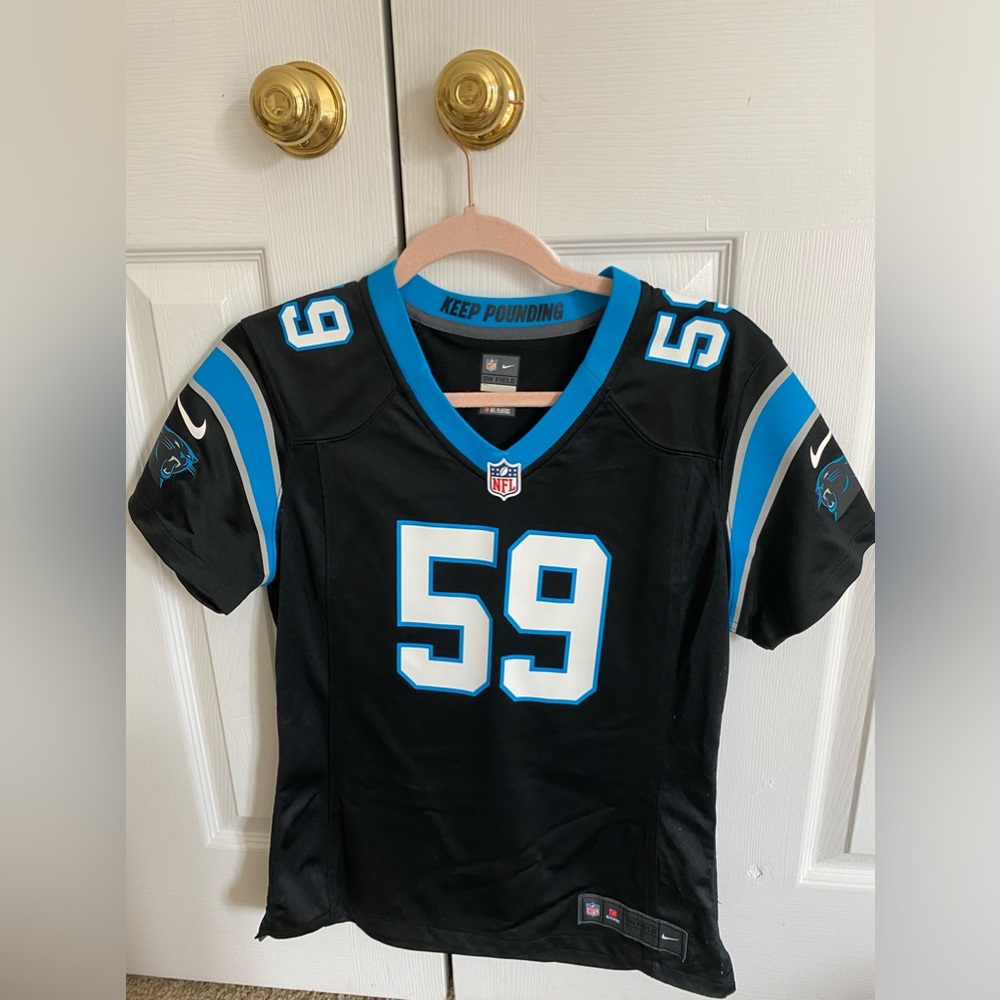 Woman's medium Carolina panthers jersey